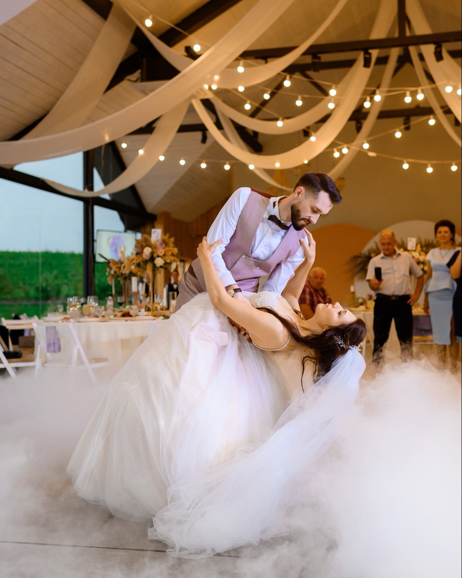 A bride and groom sharing their first dance